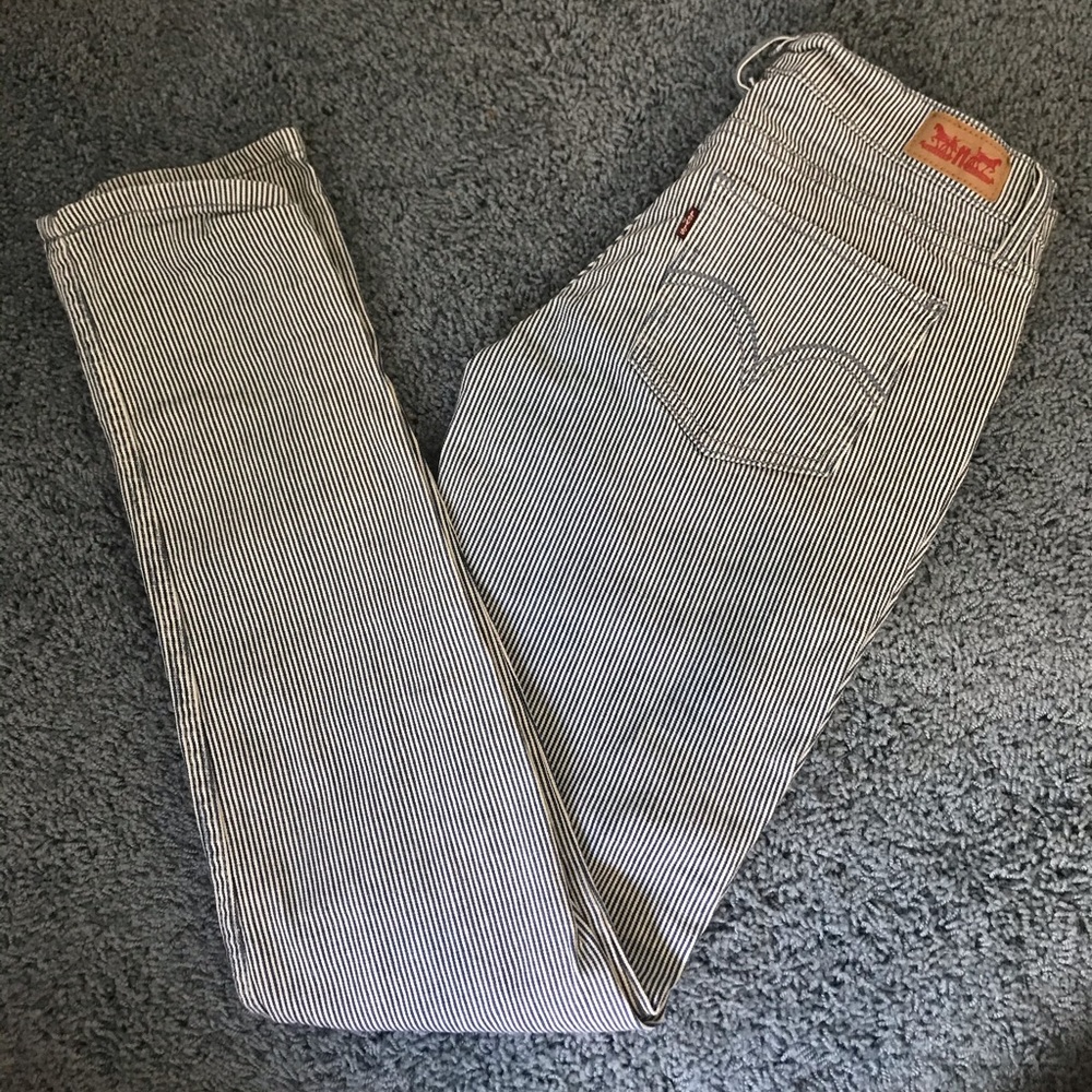 Levi’s 524 blue pinstripe skinny jeans